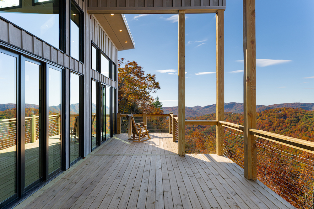 Covered outdoor living space on a Powell Construction custom mountain home